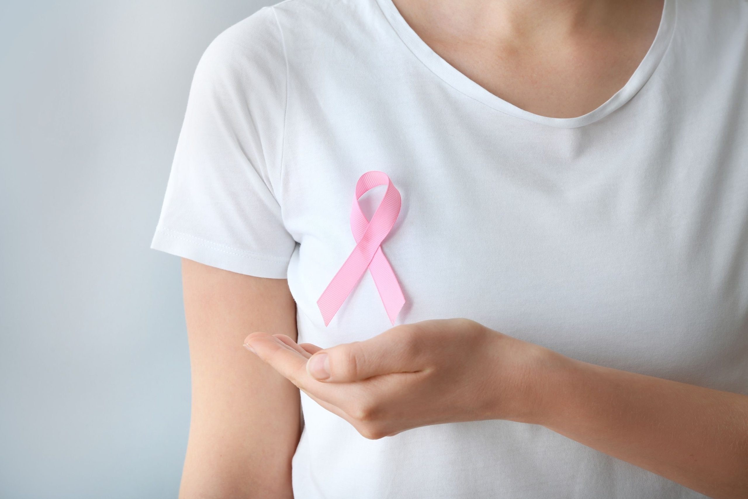 Pink ribbon symbol representing Breast Cancer Awareness Month and community support